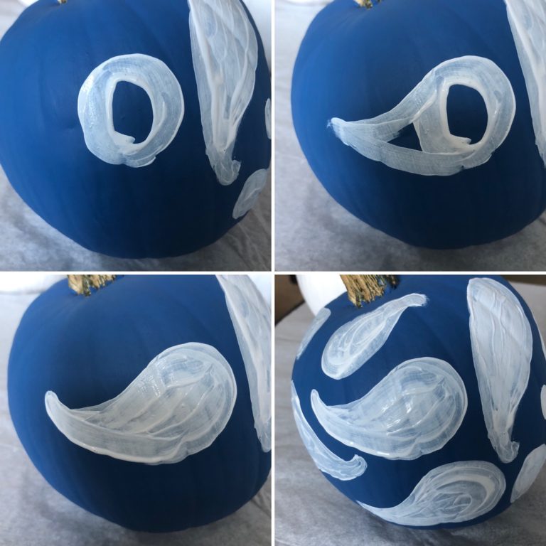 Learn how to paint a DIY  blue and white ghost pumpkin with step by step instructions. 