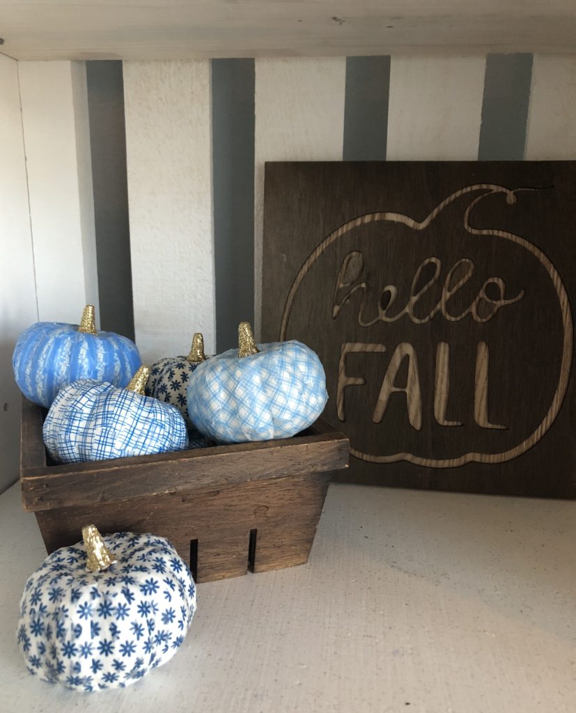Blue and white DIY washi tape pumpkin decorations for Halloween or fall. 