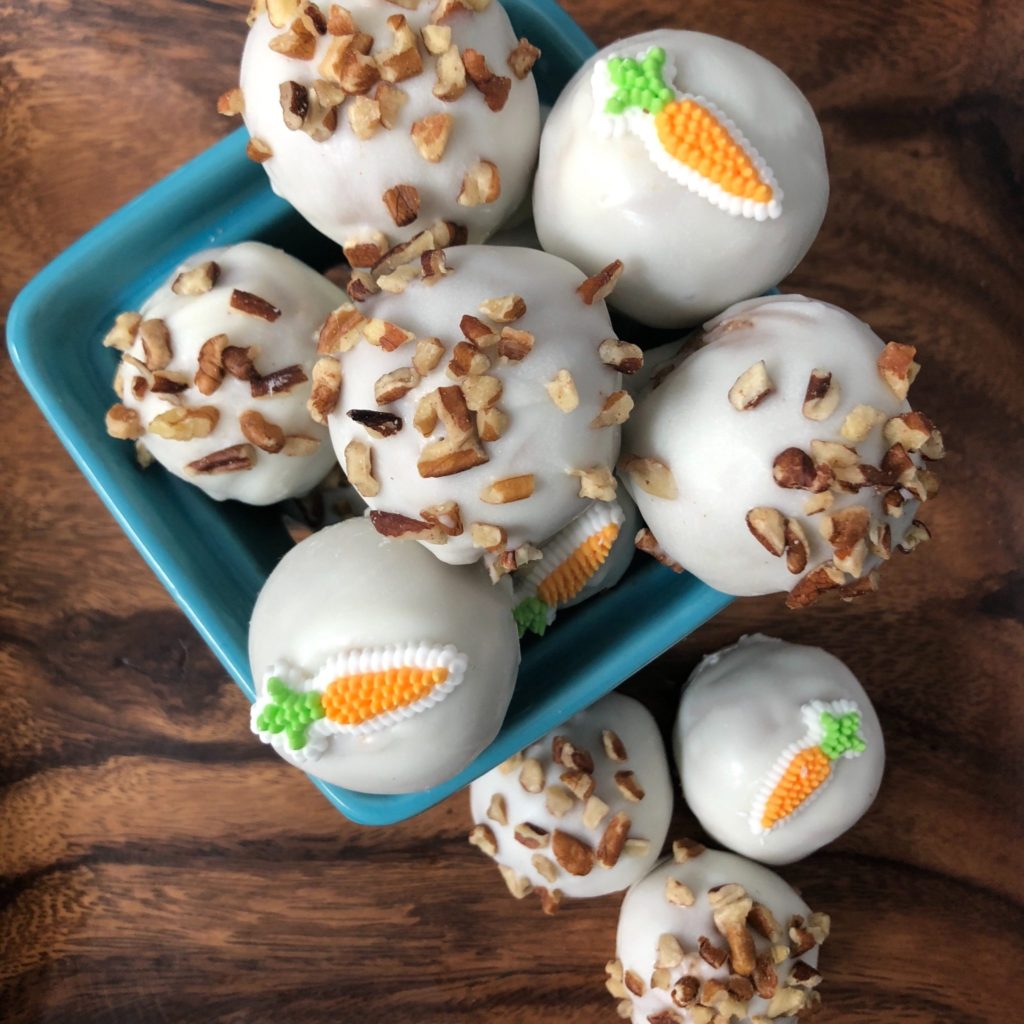 Carrot cake oreo truffles are an easy dessert for Easter--or anytime! These carrot cake oreo cookie balls only have three ingredients and are a no bake recipe. #Carrotcakeoreos #carrotcake #easter #easterdessert #cookieballs
