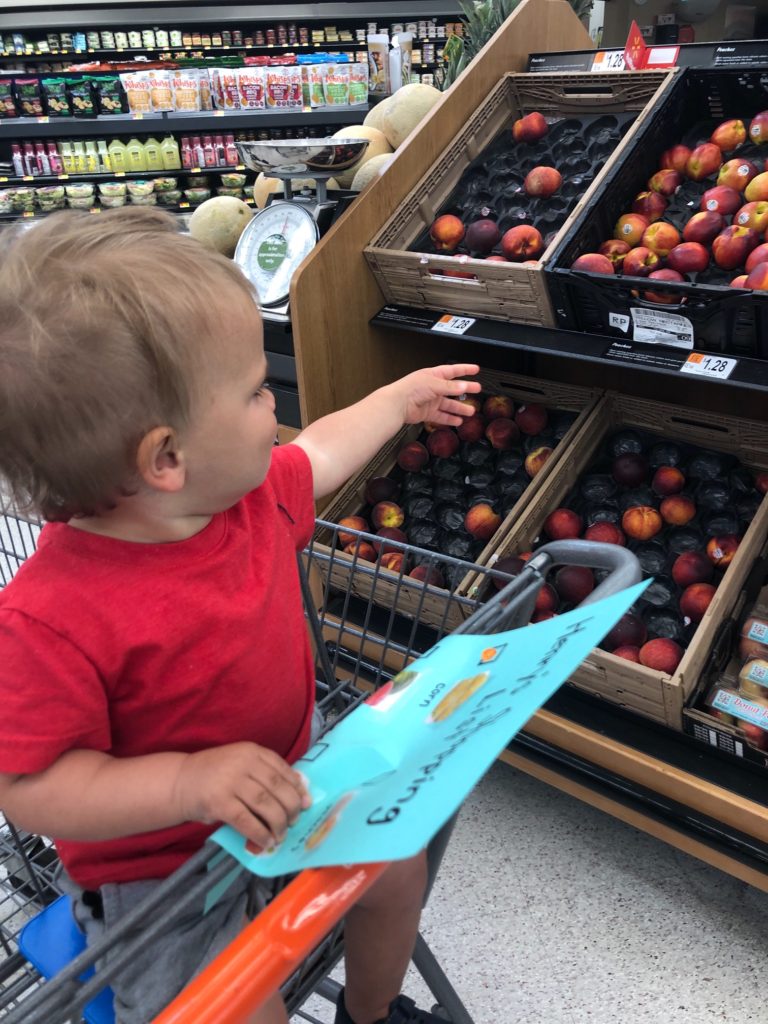 Learn how to make an easy DIY Grocery Store Scavenger Hunt for toddlers and preschoolers. Also includes free printable options. Help your kids learn fruit, vegetable and color words! #scavengerhunt #learningthroughplay #toddlerplay