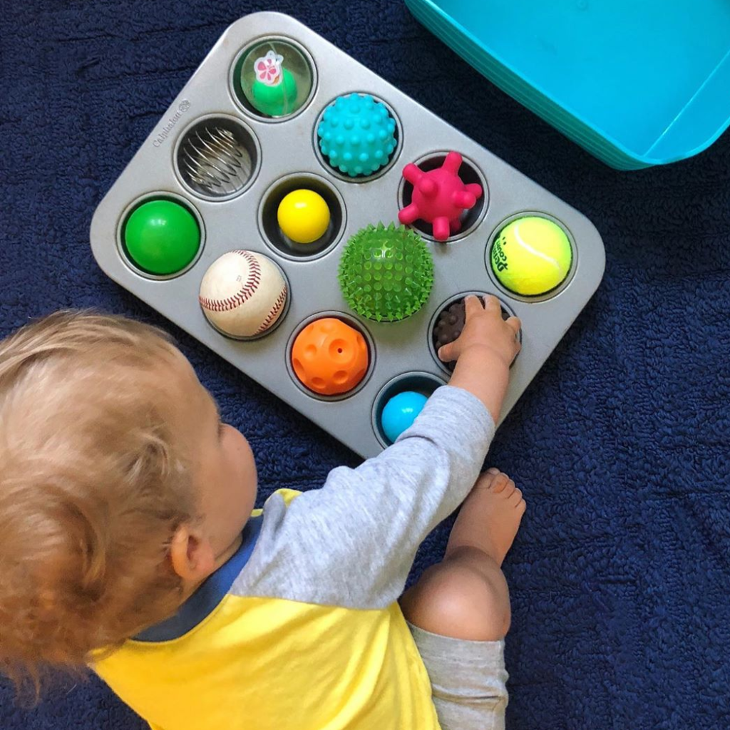 A huge list of easy and cheap indoor activities for one year old toddlers and babies. Perfect for those cold winter months when you are stuck inside! #winter #oneyearold #18months #13months #14months #15months #16months #17months #19months #toddler #20months #21months #almost2 #indooractivities