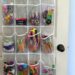 A simple kids craft supply organization idea: use an inexpensive over the door shoe organizer to keep small pieces tidy. #cheap #inexpensive #frugal #artsupplies #artsandcrafts #organization